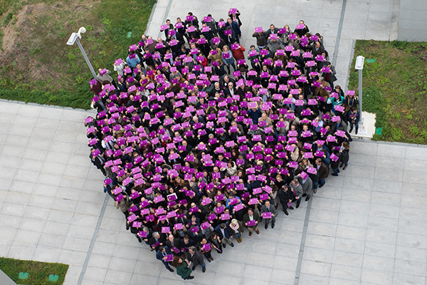 FCC employees form a heart to challenge violence against women